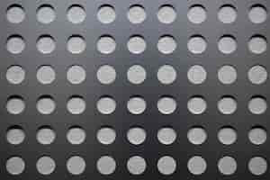 Бесплатное фото Фон с металлической сеткой и круглыми отверстиями