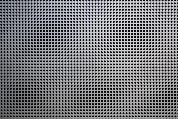 Free photo background with metallic mesh and round holes