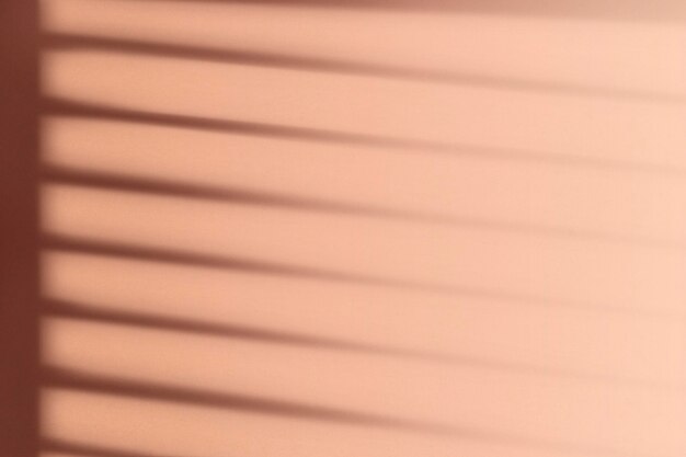 Background with window blind shadow during golden hour