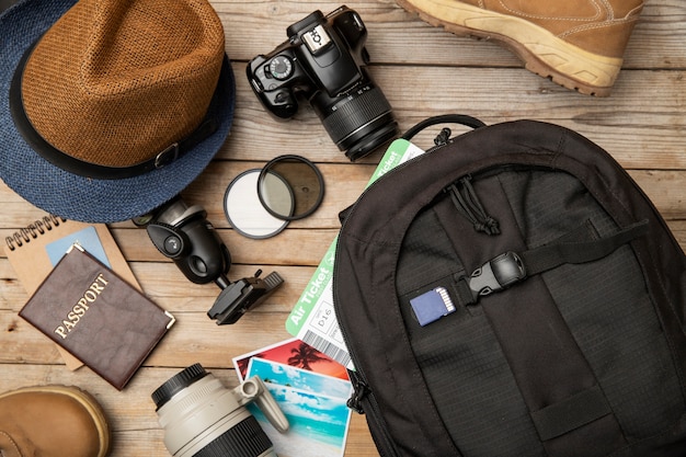 Backpack packed for travel with passport and camera