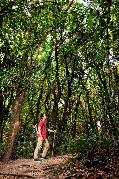 Backpacker looking up