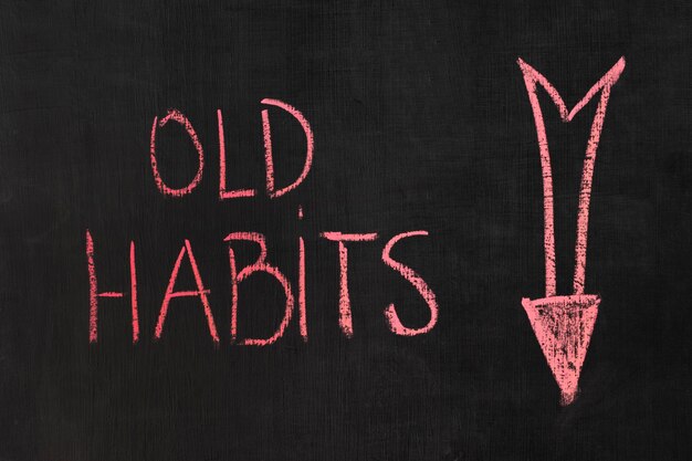 Bad habits concept with blackboard