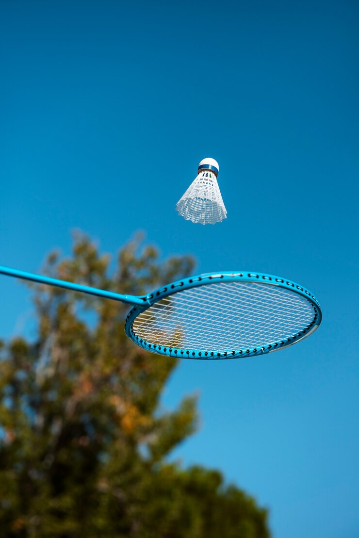 Free Photo badminton concept with racket and shuttlecock