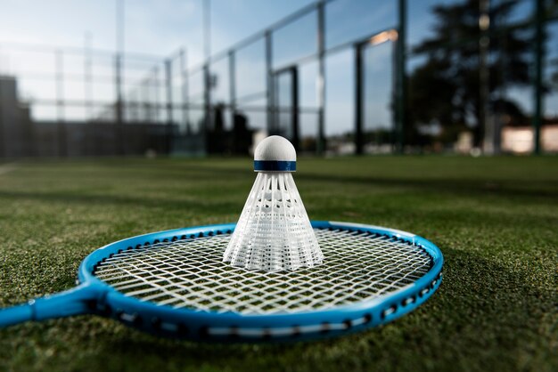 Badminton concept with shuttlecock and racket