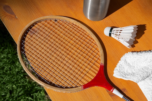 Badminton racket and shuttlecock flat lay