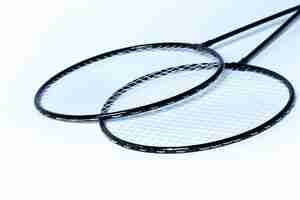 Free photo badminton rackets on white