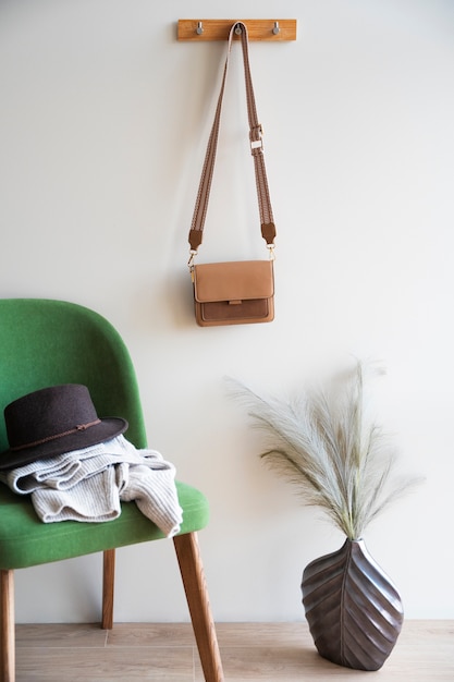 Free photo bag hanging from furniture item indoors