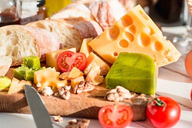 baguette and cheese on wooden