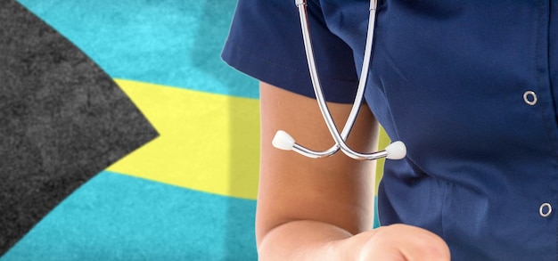 Bahamas flag female doctor with stethoscope, national healthcare system