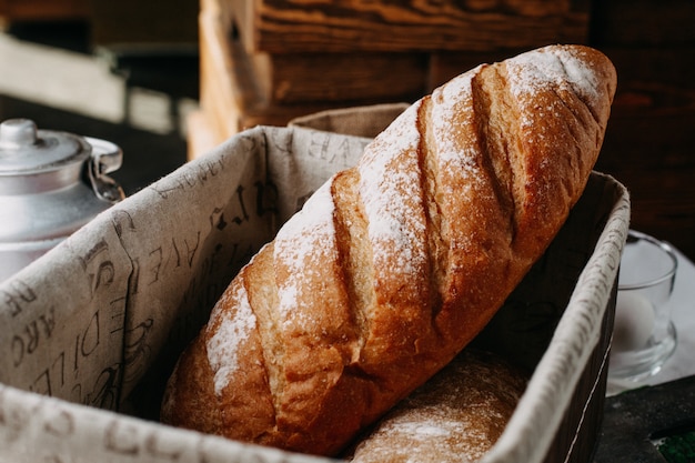 baked bread with flour whole tasty inside basket