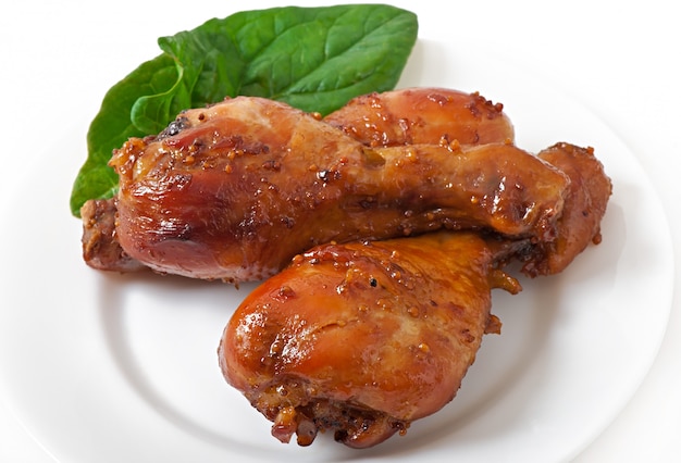 Baked chicken drumsticks in honey-mustard marinade