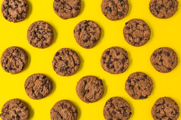 Download Premium Photo Baked Chocolate Cookies On Yellow Background PSD Mockup Templates