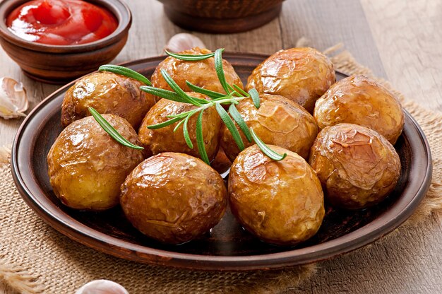 Baked potatoes with  rosemary