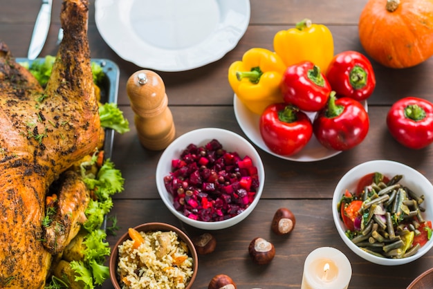 Baked turkey with salads in bowls 