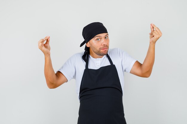 Baker man doing meditation gesture in t-shirt