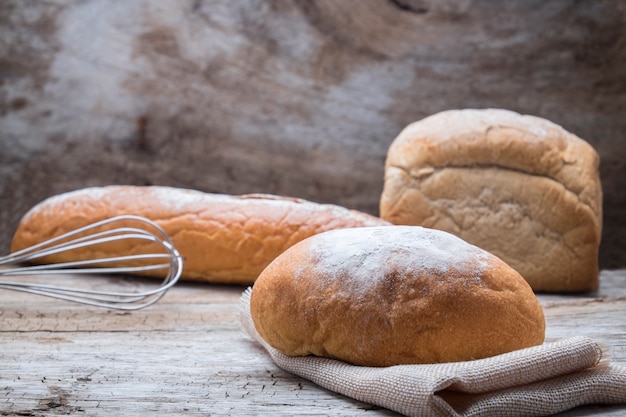 Free photo bakery bread on a wooden table.