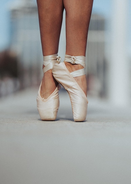 Free photo ballerina dancing in pointe shoes