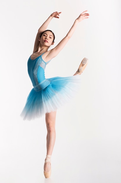 Ballerina dancing in tutu dress