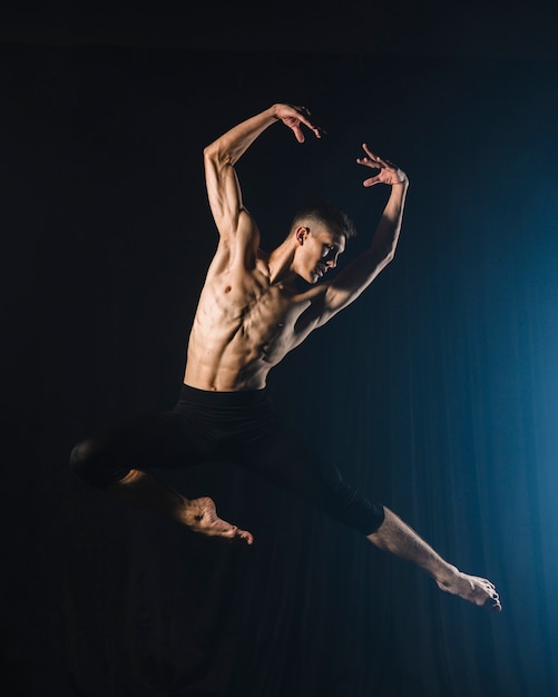 Free photo ballerino dancing with tights