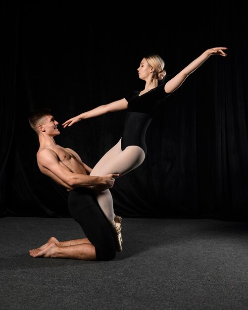 ballet woman and man posing in leotard