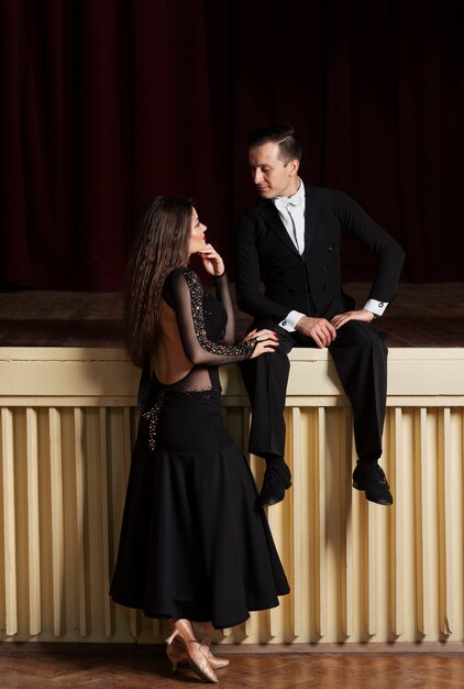 Ballroom dance partners posing together