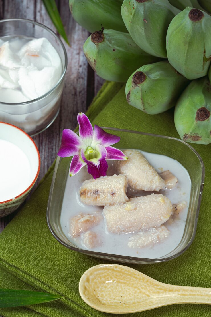 Free Photo banana in coconut milk, asian traditional thai desserts, thai desserts.