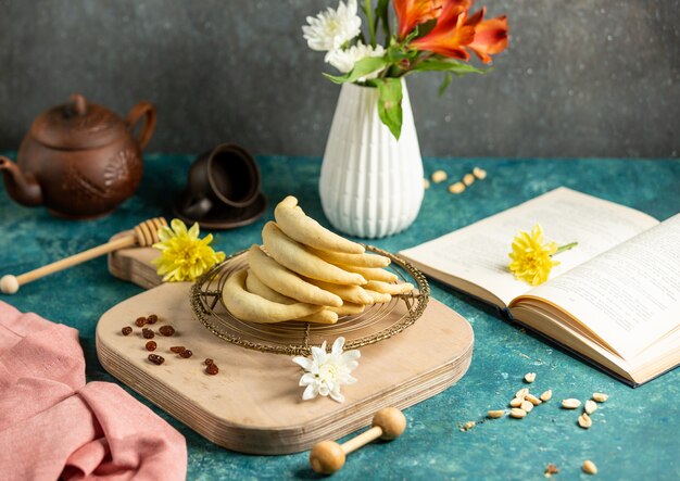 Banana cookies with flowers on the table