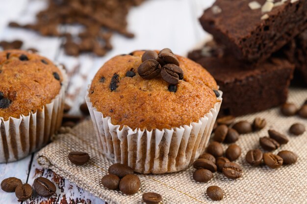 Banana cupcakes mixed with chocolate chip on a white plate.