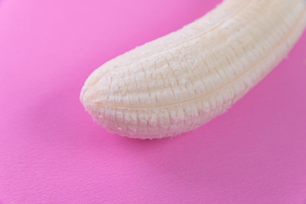 Free photo banana on the pink