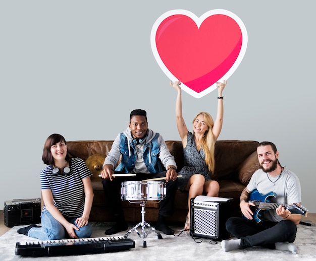 Band of musicians holding a heart emoticon