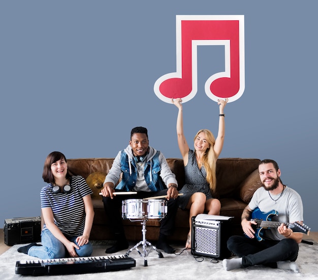 Free photo band of musicians holding a musical note icon