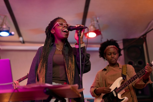 Free photo band of musicians playing music at a local event