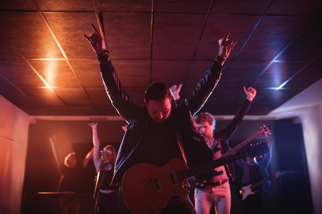 Band performing in studio