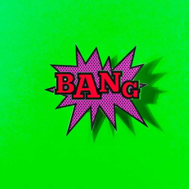 Bang text on explosion bubble against green backdrop