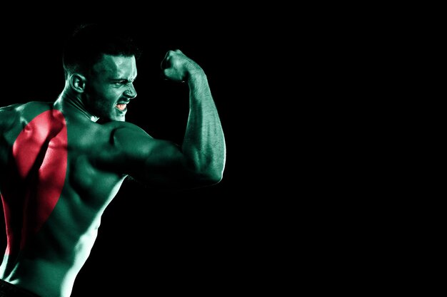 Bangladesh flag on handsome young muscular man black background