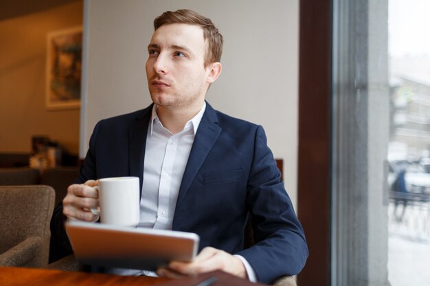 Banker in cafe