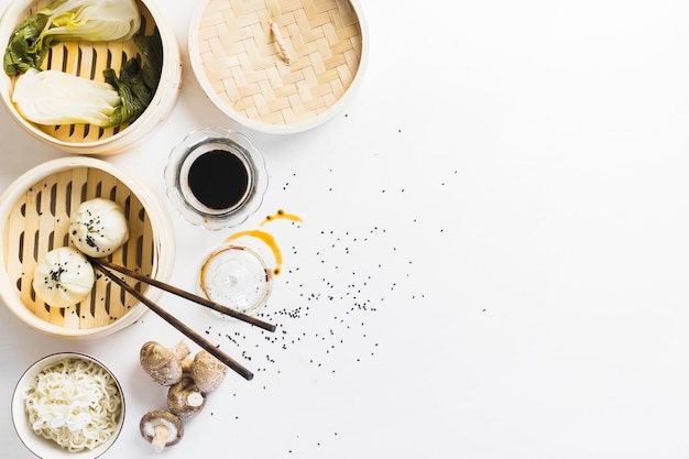 Baozi between soy sauce and noodles