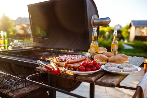 Barbecue grill party. Tasty food on wooden desk.