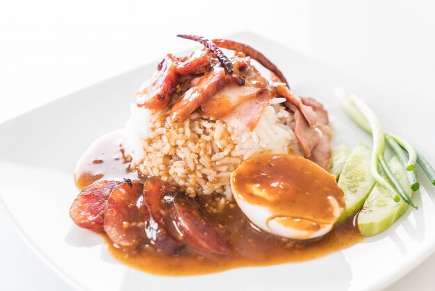 Barbecued red pork in sauce with rice