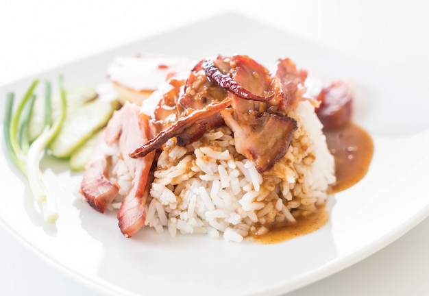 Barbecued red pork in sauce with rice