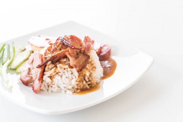 Barbecued red pork in sauce with rice