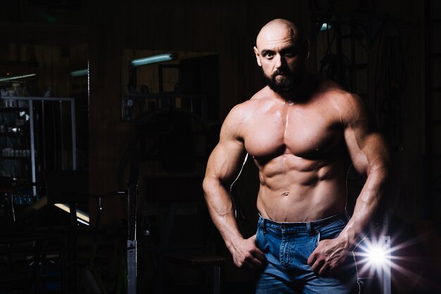 Bare-chested man posing for camera