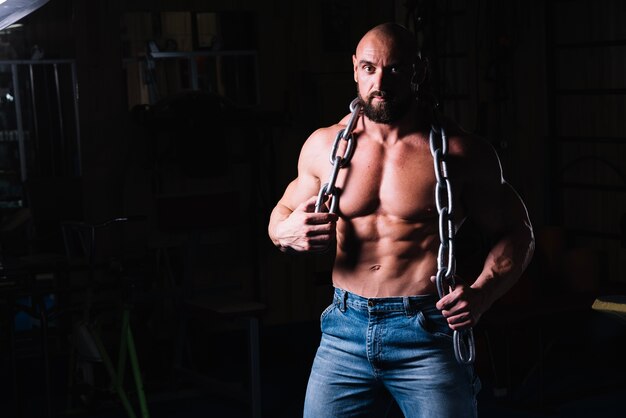 Bare-chested man with chain