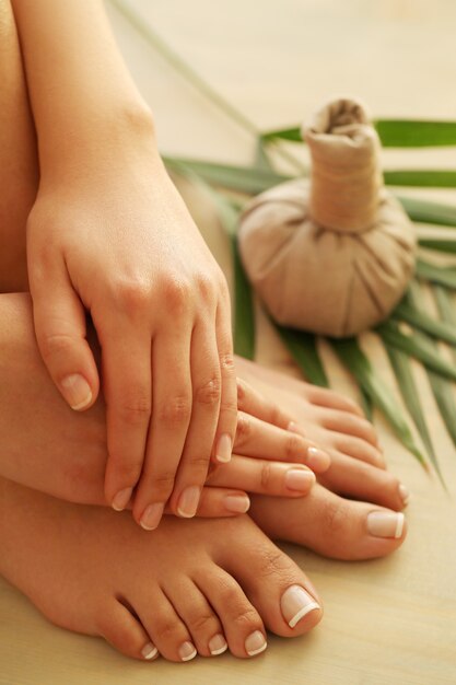 Bare feet and hands. Pedicure and manicure concept