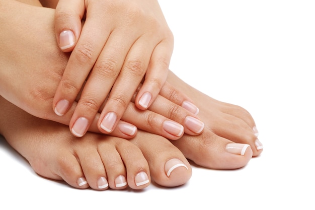 Free photo bare feet and hands. pedicure and manicure concept