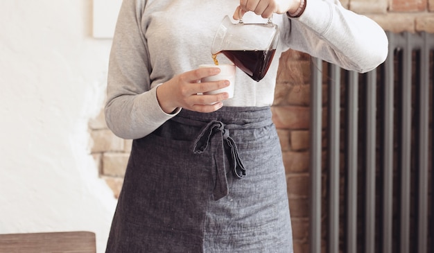 Barista making coffee