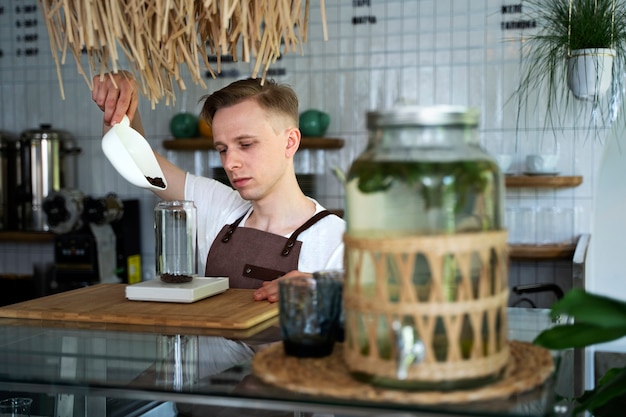 Barista preparing beverage