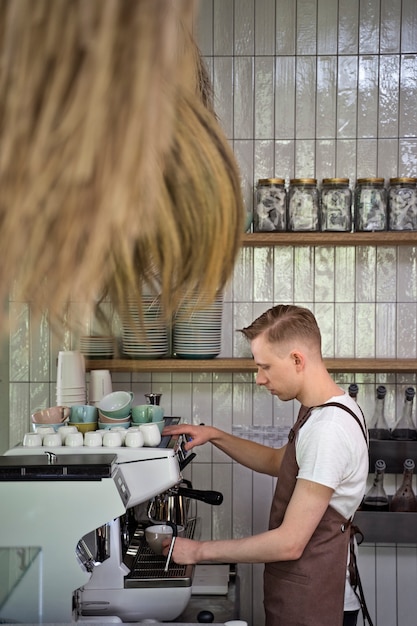 Barista preparing beverage