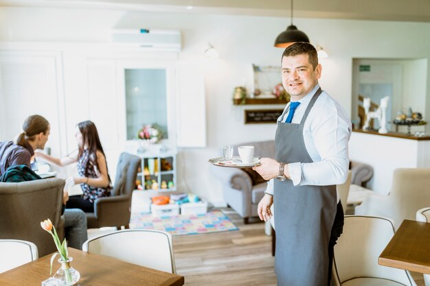 Barman serving coffee