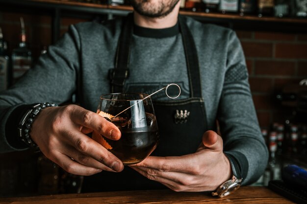 Barman with a cocktail